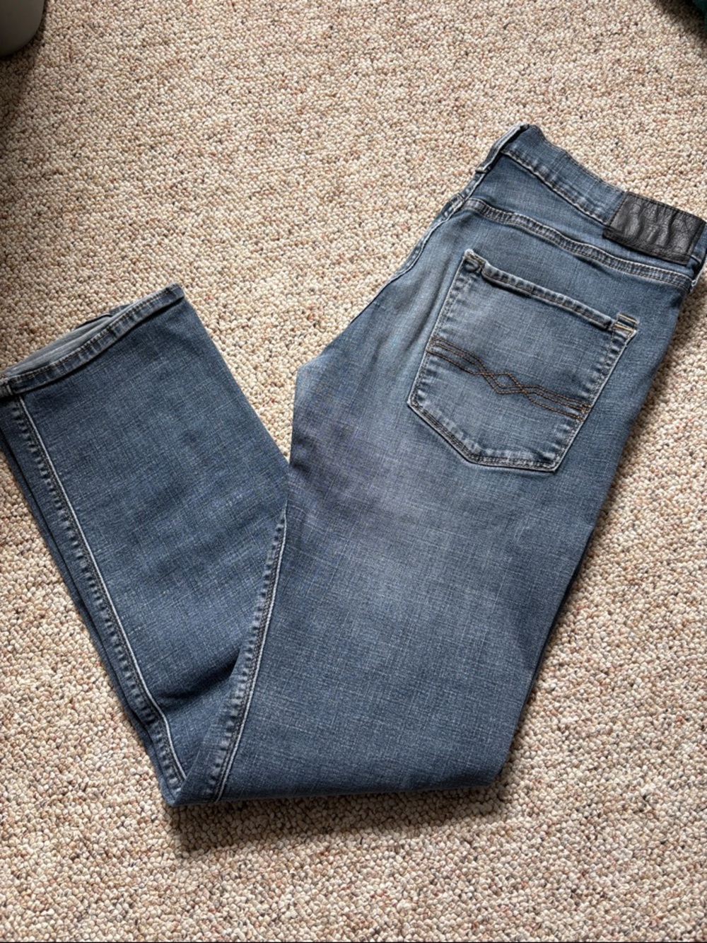 Denizen from Levi's Men's Slim Straight Jeans in Faded Blue